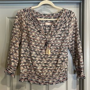 Like new Tory Burch blouse. Can be worn on or slightly off shoulder. Multi-color